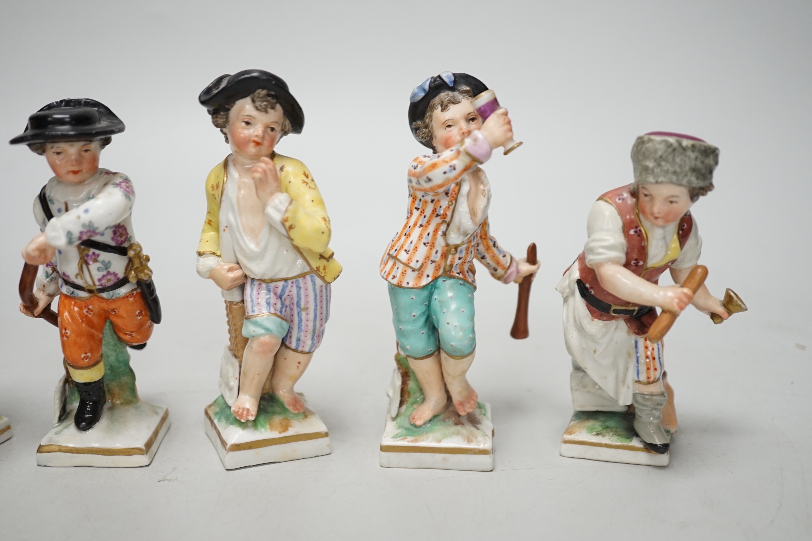A group of six Berlin porcelain figures, 19th century, tallest 10.8cm